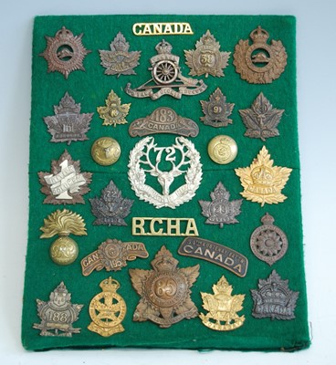 Lot 69 - A collection of cap badges and insignia,...