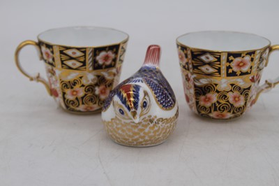 Lot 211 - A pair of Royal Crown Derby imari coffee cans,...
