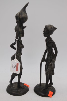 Lot 228 - Two African metal figures, h.28cm