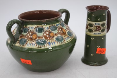 Lot 230 - A Devonshire green glaze pottery twin handled...