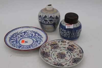 Lot 232 - A Chinese blue and white glazed stoneware...