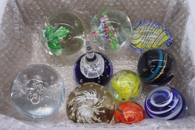 Lot 233 - A collection of ten glass paperweights, to...