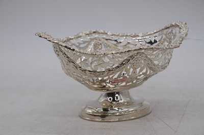 Lot 244 - A George V pierced silver basket, maker George...