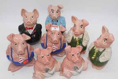 Lot 70 - A set of eight Wade Natwest piggy-banks, the...