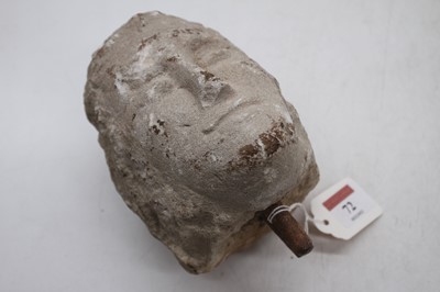 Lot 72 - An antique carved limestone head, h.13cm