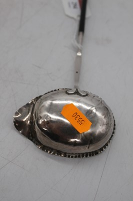 Lot 294 - A Georgian silver toddy ladle, having ebonised...