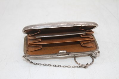 Lot 292 - A George V silver purse, having engine turned...