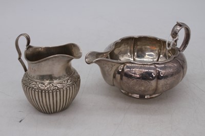 Lot 310 - A Victorian silver milk jug, London 1862,...