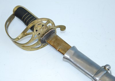 Lot 91 - A reproduction Cavalry style sword, having an...