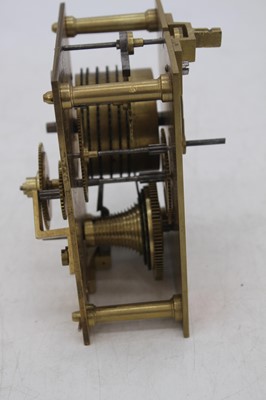 Lot 281 - A Victorian brass wall clock movement (only),...