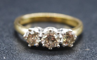 Lot 2704 - An 18ct yellow and white gold, diamond...