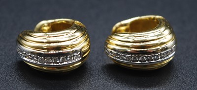 Lot 2693 - A pair of 18ct yellow and white gold diamond...