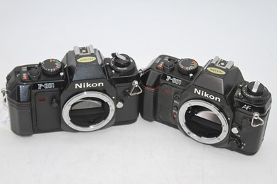 Lot 314 - A Nikon F-501 SLR camera body, serial #5514423,...