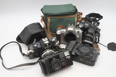 Lot 316 - Five Nikon cameras, to include a Coolpix 8700...