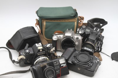 Lot 316 - Five Nikon cameras, to include a Coolpix 8700...