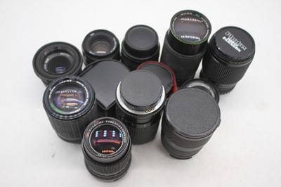 Lot 336 - A collection of various lenses and converters,...