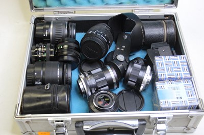 Lot 348 - A flight case containing ten camera lenses, to...
