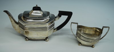 Lot 2160 - An Edwardian silver teapot and sugar duo, each...