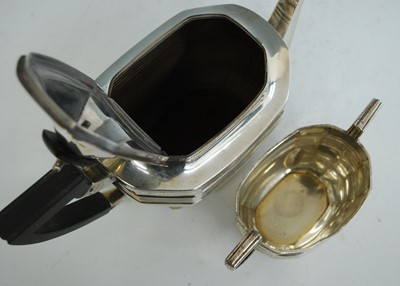Lot 2160 - An Edwardian silver teapot and sugar duo, each...