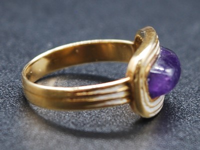 Lot 2646 - A late Georgian yellow metal and amethyst...