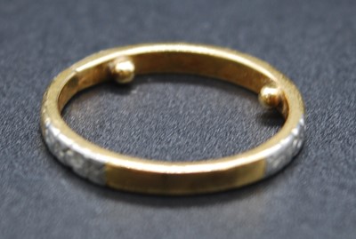 Lot 2648 - A gent's 18ct gold and platinum faced wedding...