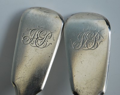 Lot 2141 - A matched pair of antique silver sauce ladles,...