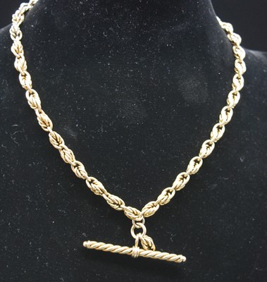 Lot 2667 - A yellow metal rope link double watch chain...
