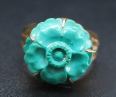 Lot 2670 - A 9ct gold turquoise dress ring, the five-claw...