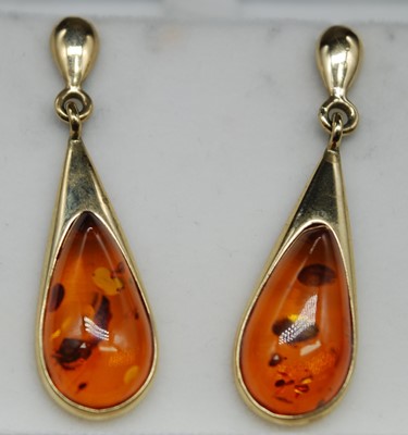 Lot 2682 - A pair of modern 9ct gold and orange amber set...