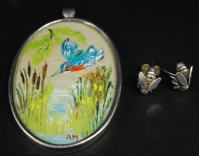 Lot 2689 - A modern Arts & Crafts silver pendant, having...