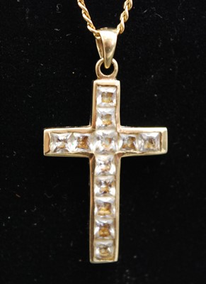 Lot 2692 - A modern 9ct gold and cz set cross pendant,...