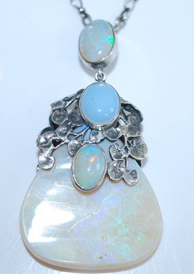 Lot 2729 - A white metal Art Nouveau style opal pendant,...