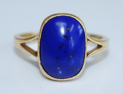 Lot 2737 - An 18ct yellow gold and lapis lazuli dress...