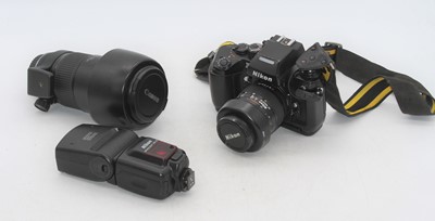 Lot 366 - A Nikon F4 SLR camera, together with a Nikon...