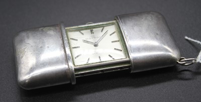 Lot 2759 - A Movado Turler white metal cased purse watch...