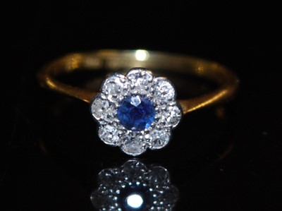 Lot 2774 - An 18ct gold and platinum sapphire and diamond...