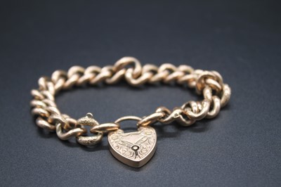 Lot 2786 - A 9ct gold hollow curb link bracelet, each...