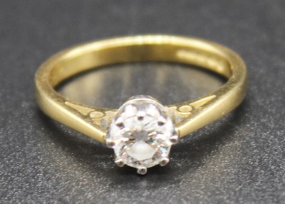 Lot 2804 - An 18ct gold diamond solitaire ring, the eight...