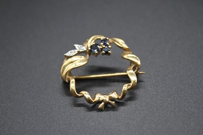 Lot 2821 - A contemporary 9ct gold sapphire and diamond...