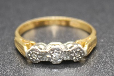 Lot 2837 - A vintage 18ct gold diamond three stone ring,...