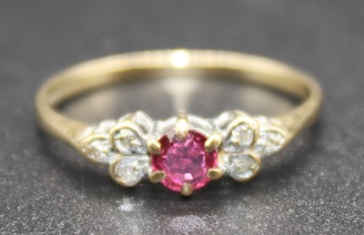 Lot 2838 - A 9ct gold ruby and diamond point dress ring,...