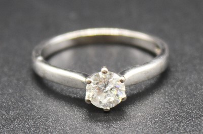 Lot 2810 - An 18ct white gold diamond single stone ring...