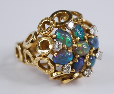 Lot 2203 - An 18ct yellow gold, opal and diamond bombe...