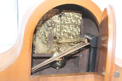 Lot 8 - A 1920s walnut cased mantel clock having a...