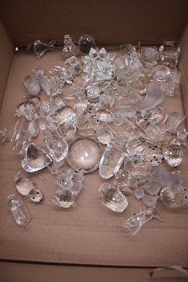 Lot 223 - A collection of Swarovski crystal ornaments,...