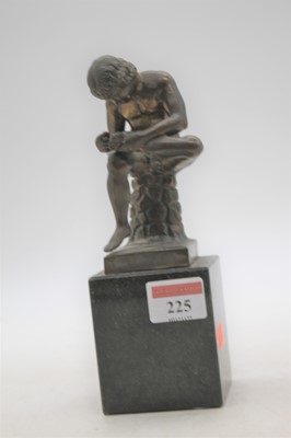 Lot 225 - A bronze figure of a Spinario, surmounted upon...