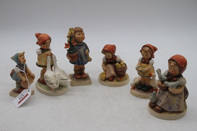 Lot 239 - A collection of six Goebel figures of children,...