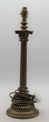 Lot 34 - A brass table lamp having a Corinthian capital...