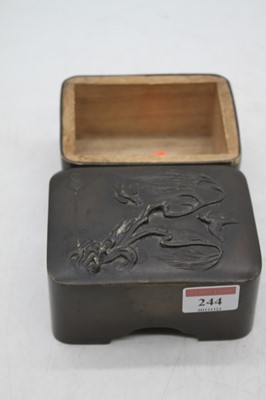 Lot 244 - A Japanese Meiji period bronze box, the lid...