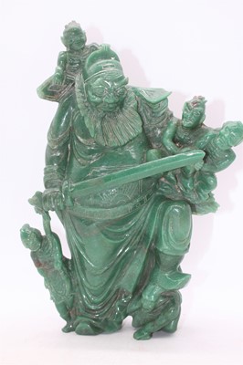 Lot 249 - A Chinese ? green polished hardstone figure...